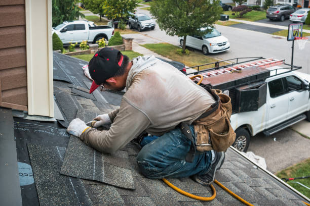 Professional Roofing technician working in Norwich, NY